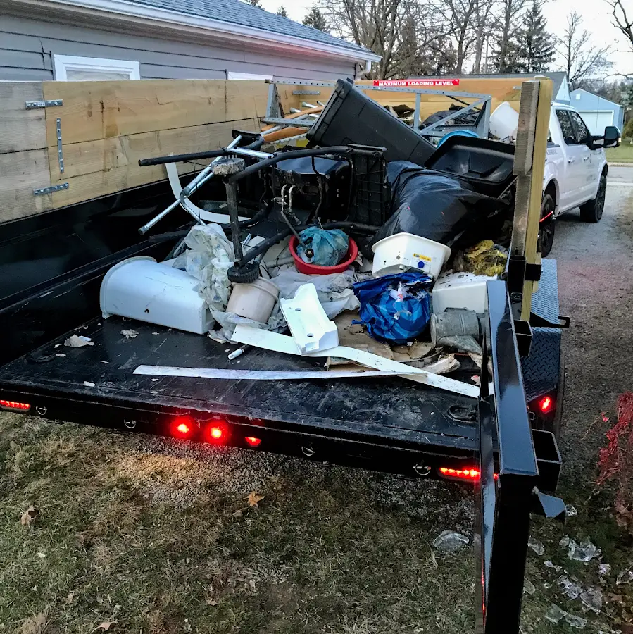 Roll-off dumpster delivered to a residential driveway in Green