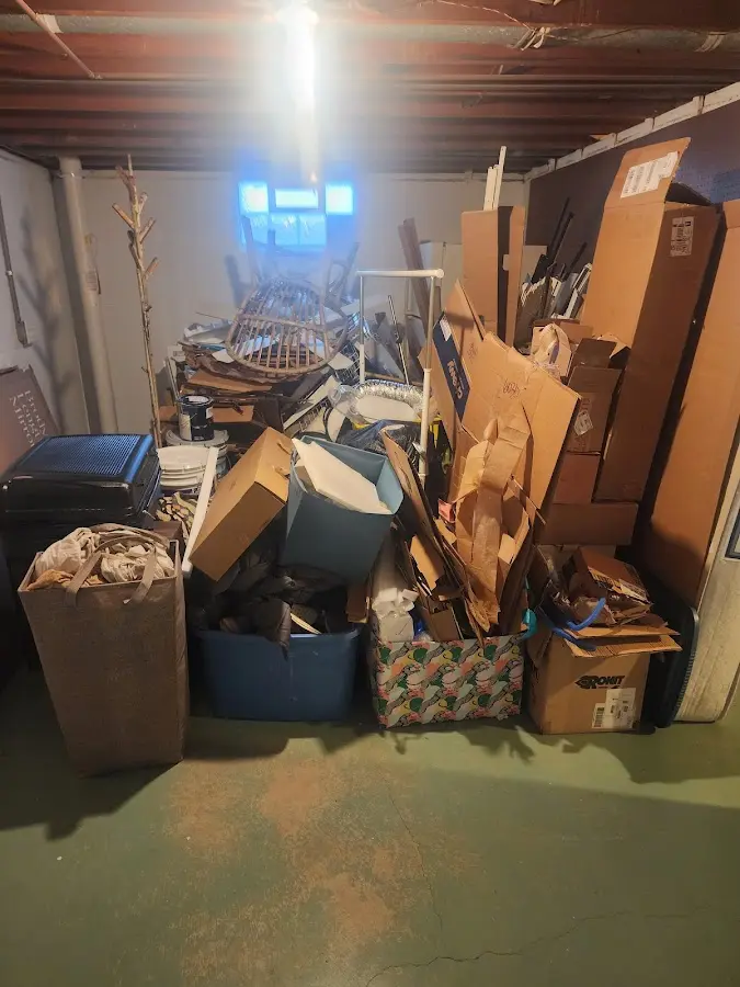 Roll-off dumpster container at job site for 40 Yard Dumpster Rental in Green